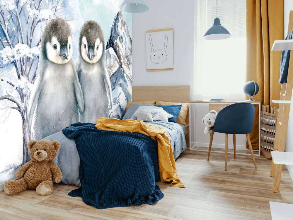 Cute penguins in winter landscape