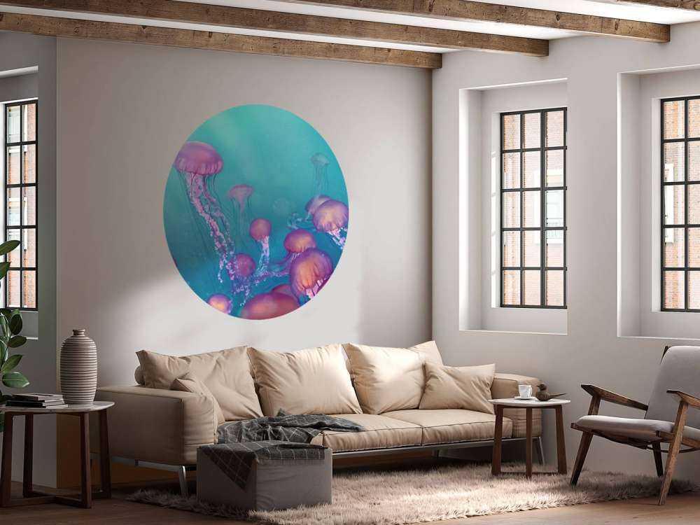 Pink jellyfish in blue sea