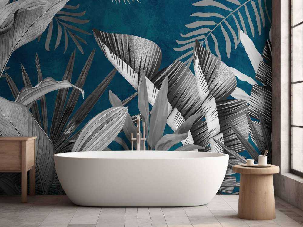 Tropical leaves on a blue background