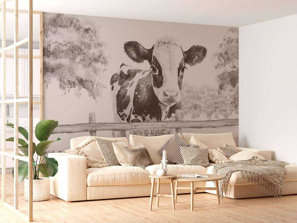 Baby cow in a field beige