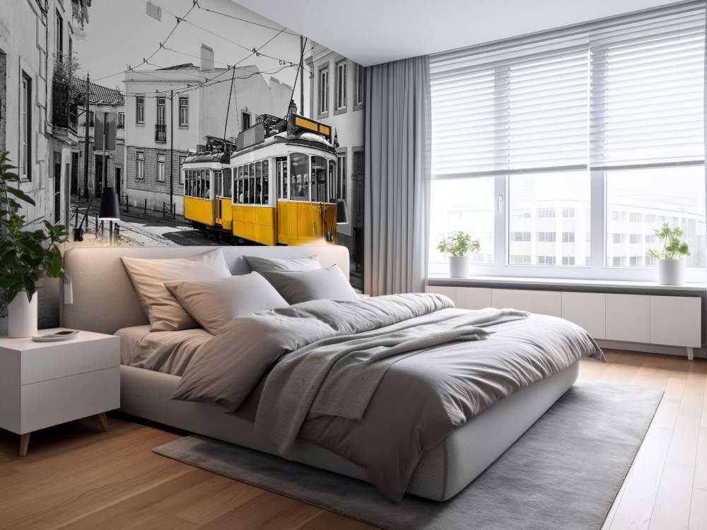 Yellow tram in a black and white street