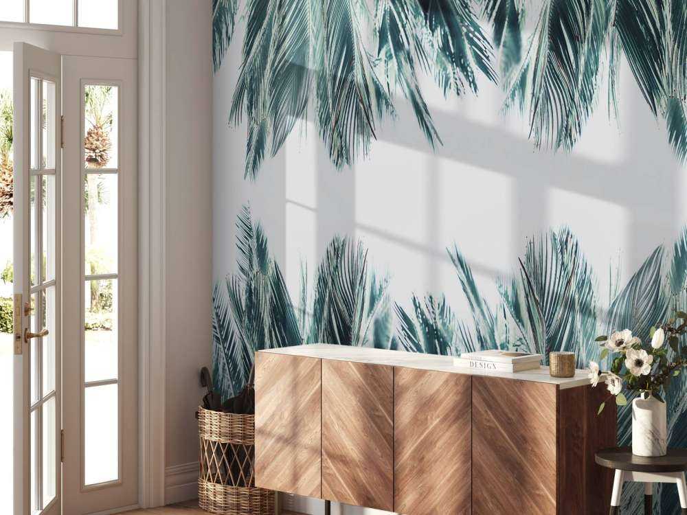 Palm leaves on white background