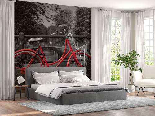 Red bike on bridge