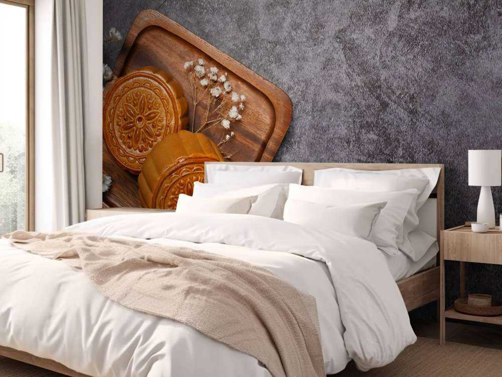 Moon cakes on a black countertop