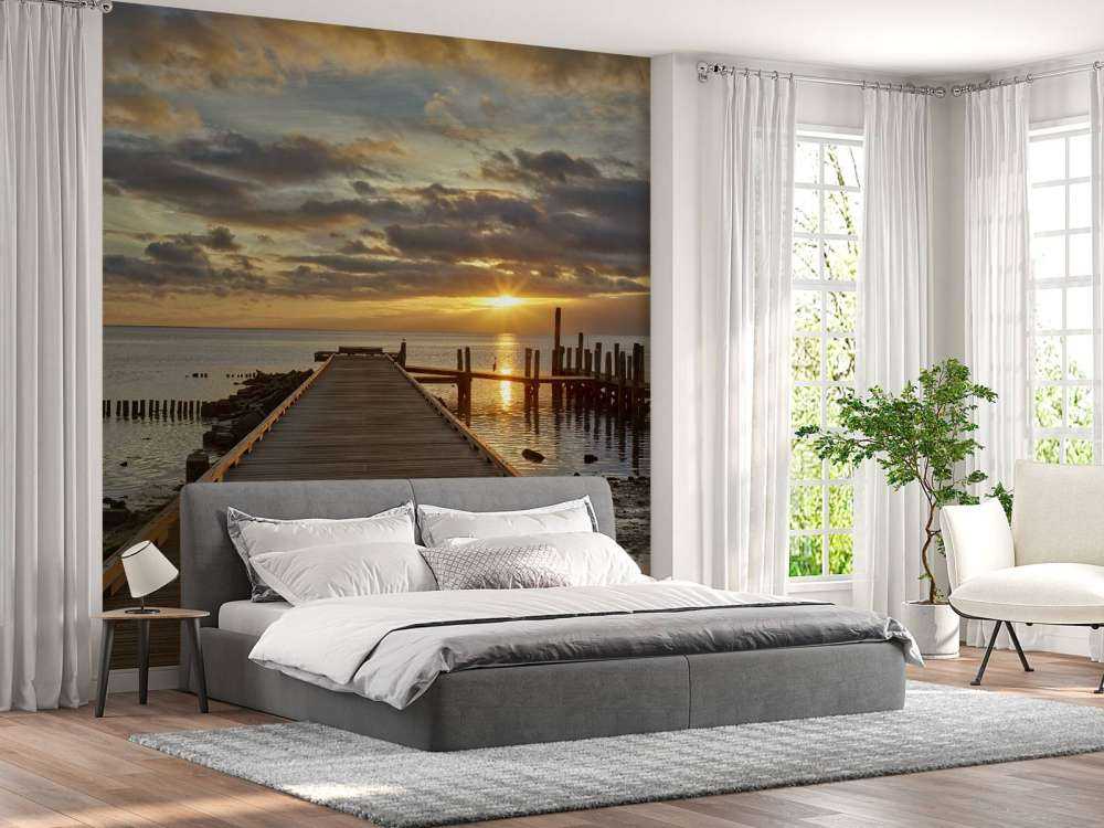 Wooden jetty with sunrise