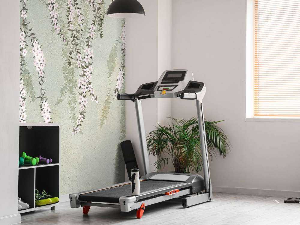 Flower branches on green concrete