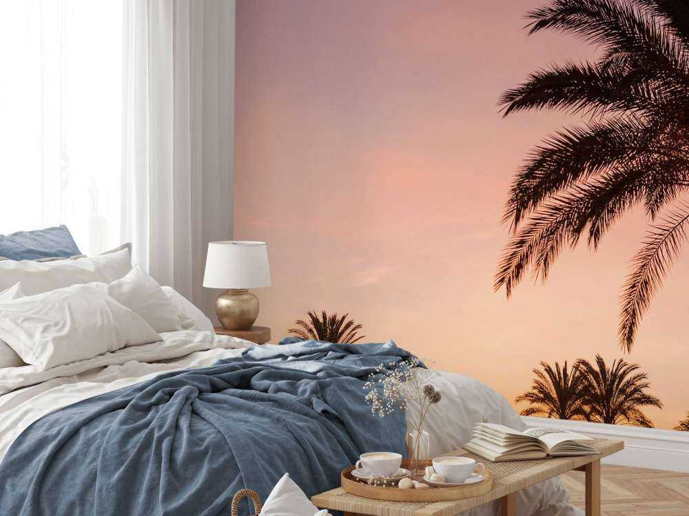 Palmbomen en zonsondergang