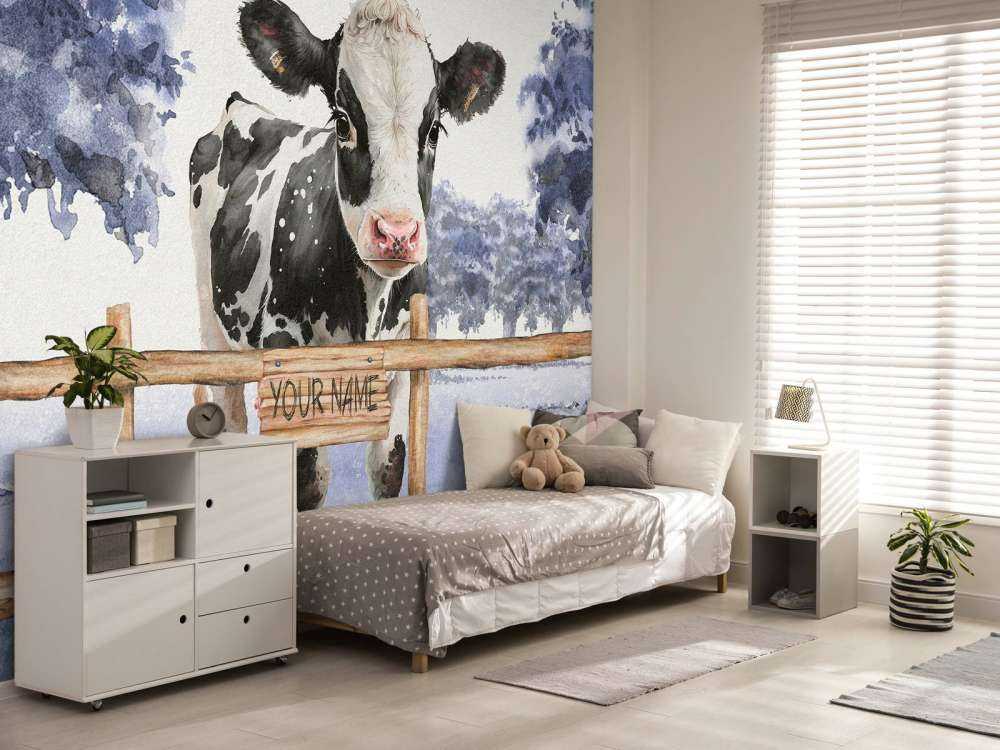 Young cow in a meadow blue