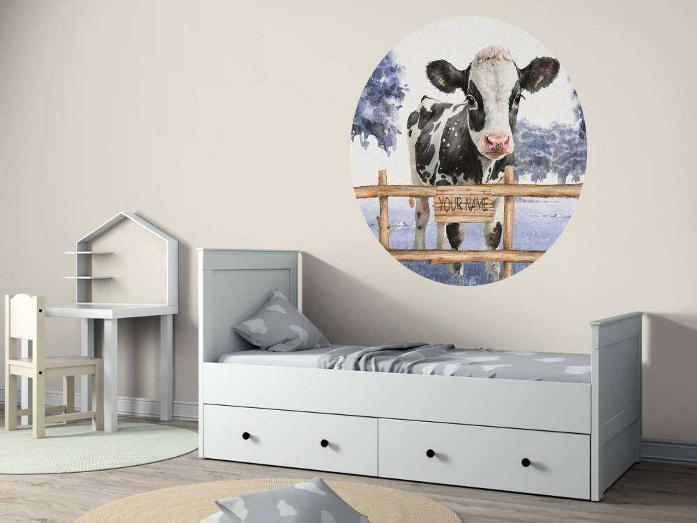 Young cow in a meadow blue