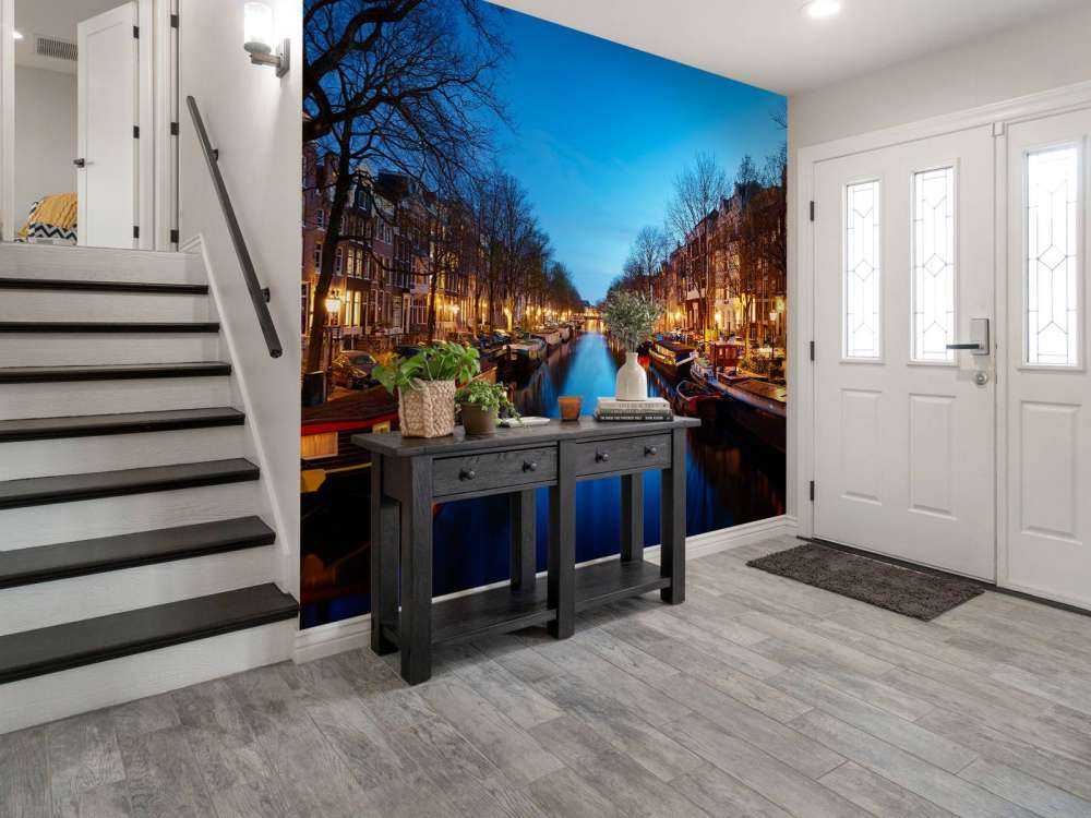 Houseboats along illuminated canal