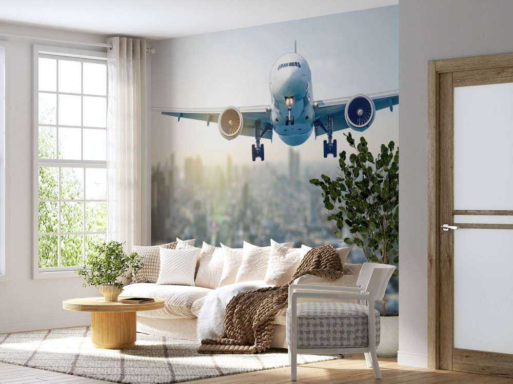 Descending airplane over a city