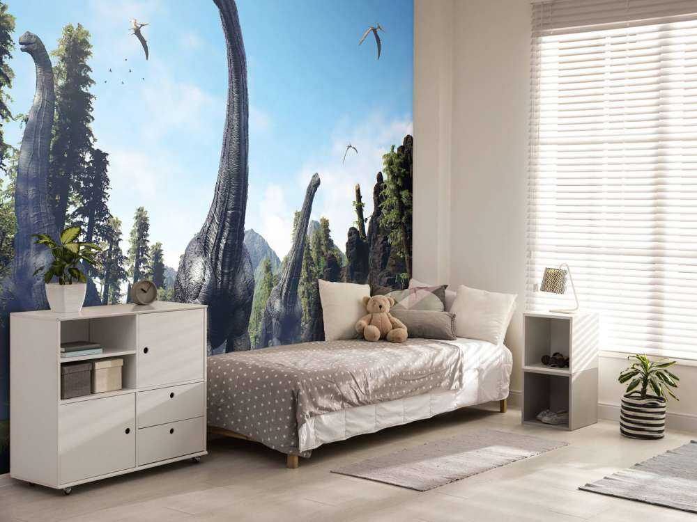 Alamosaurus group walking through a valley