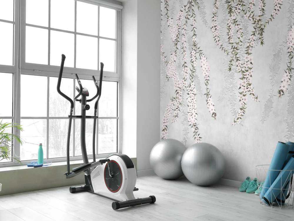 Flower branches on light blue concrete