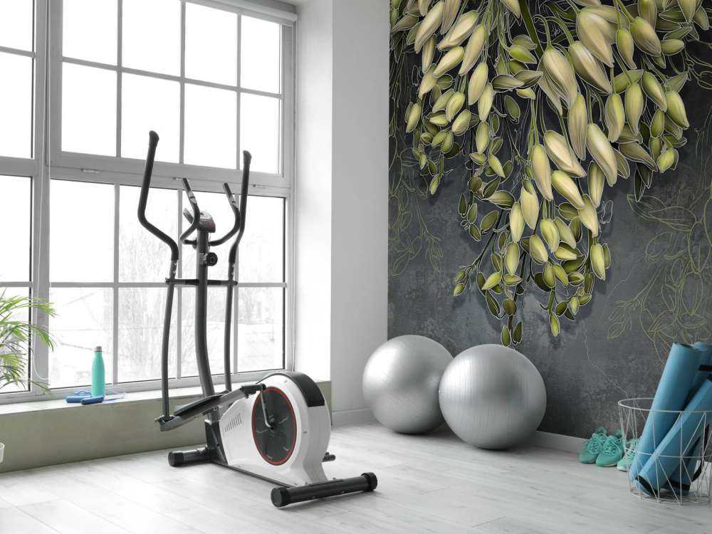 White flower calyxes on a dark gray concrete structure