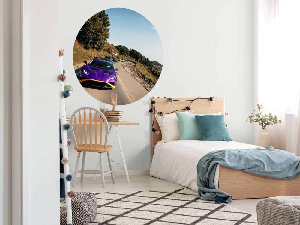 Supercar convoy through the mountains