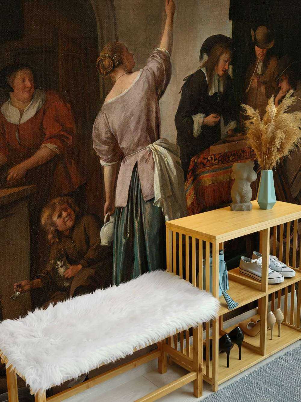 Interieur met een vrouw die een papegaai voert