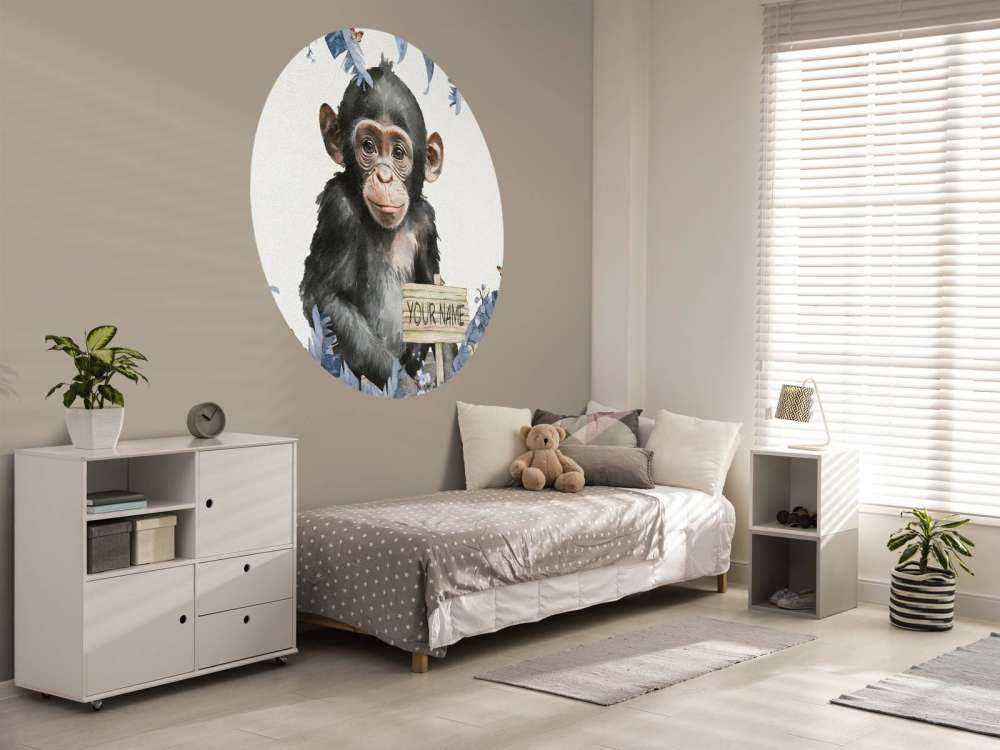 Baby chimp in the jungle blue