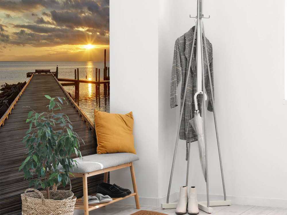 Wooden jetty with sunrise