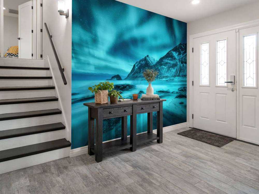 Blue northern lights with mountains