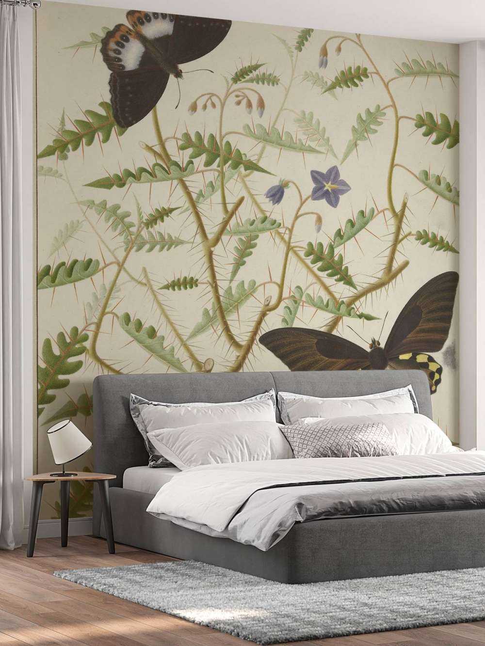 A blossoming shrub with two exotic butterflies