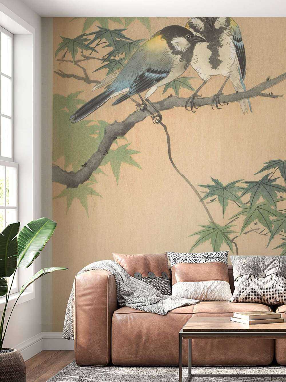 Great tits on maple branch