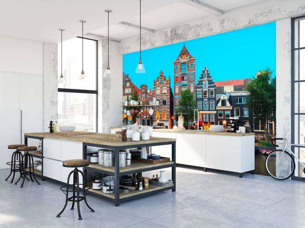 Amsterdamse grachtenpanden in de avond