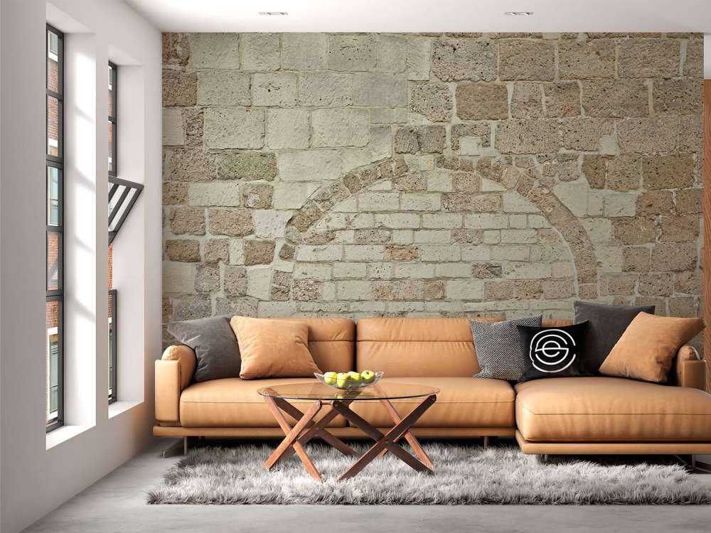 Old stone wall with arch