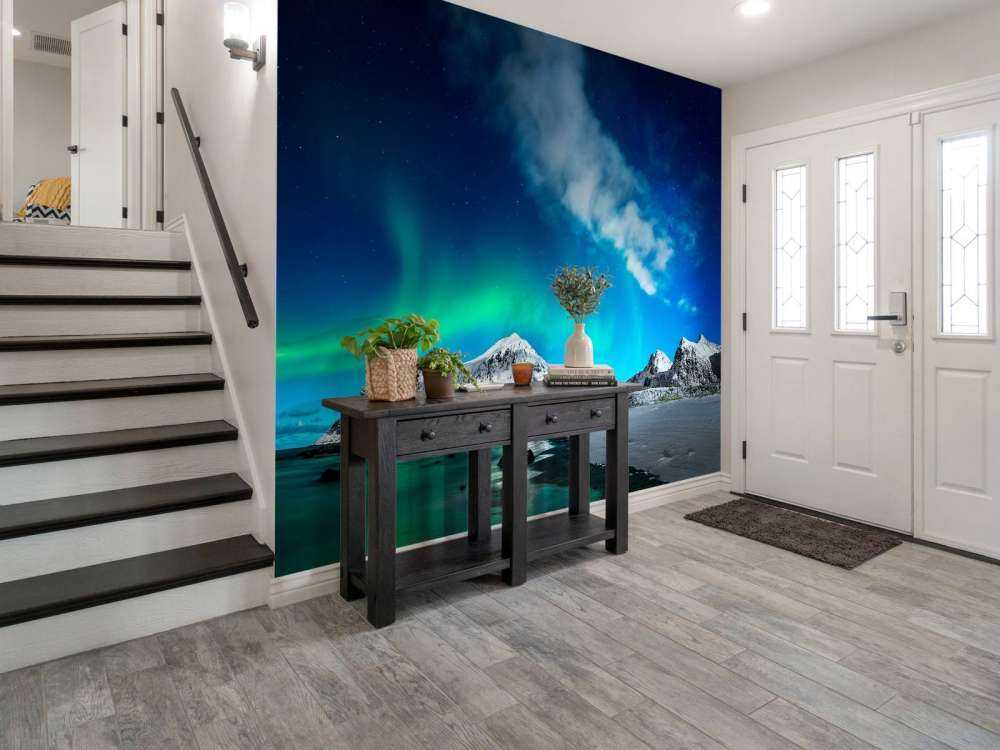 Northern lights above mountains