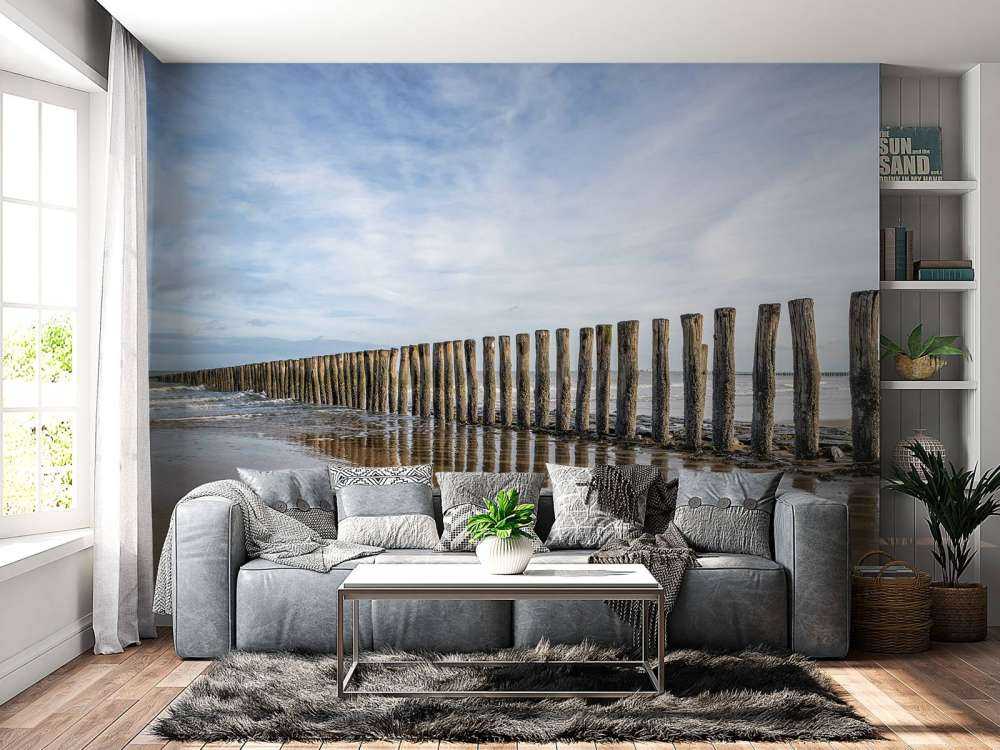 Wooden breakwater on the coast at Cadzand bath