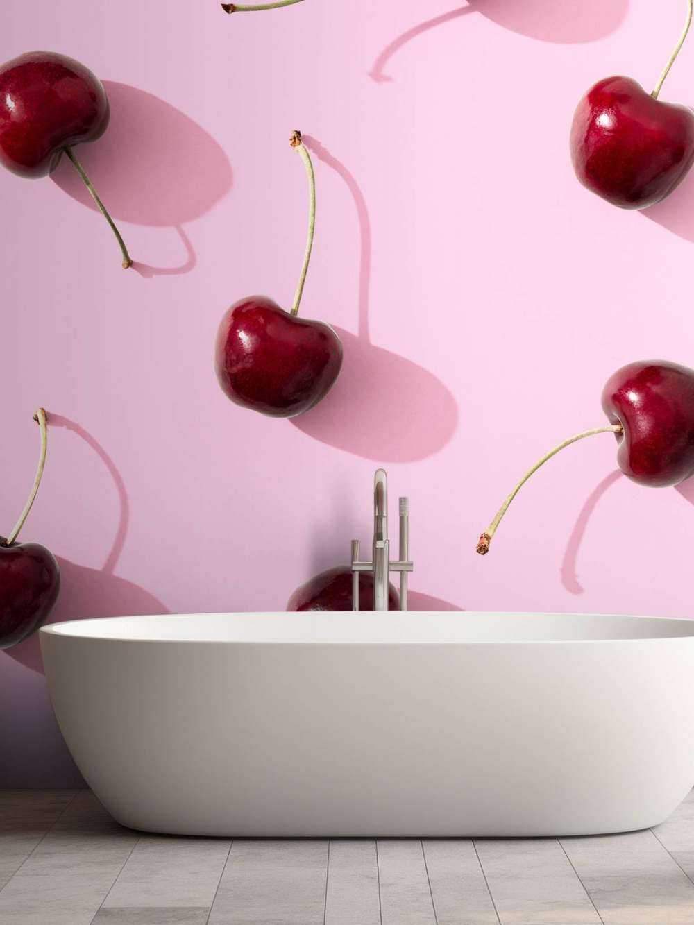 Cherries on pink background