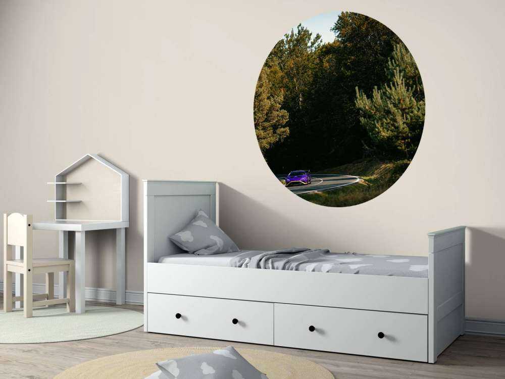 Purple Lamborghini Huracán in woodland landscape