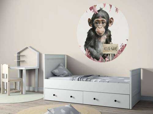 Baby chimpanzee in the jungle pink
