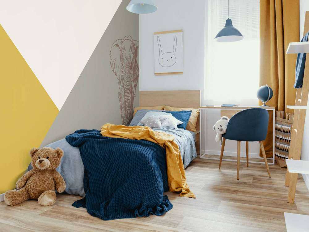 Triangles in ochre yellow and green with elephant