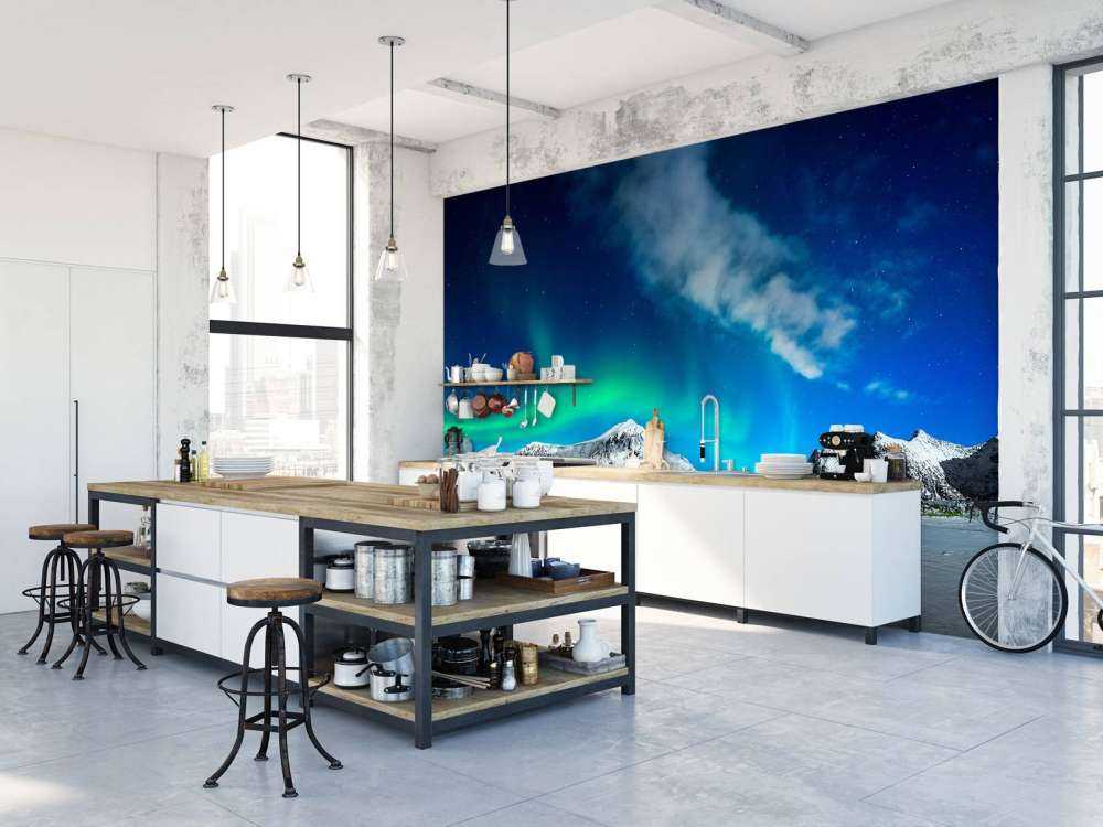 Northern lights above mountains