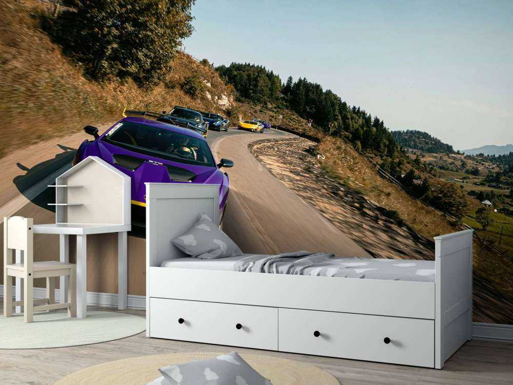 Supercar convoy through the mountains