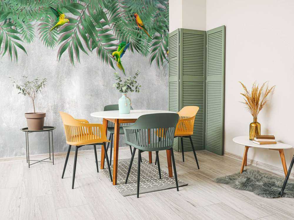 Tropical leaves and parakeets