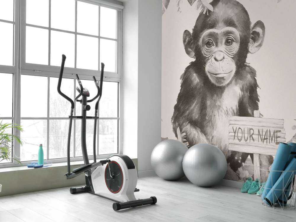 Baby chimpanzee in the jungle beige