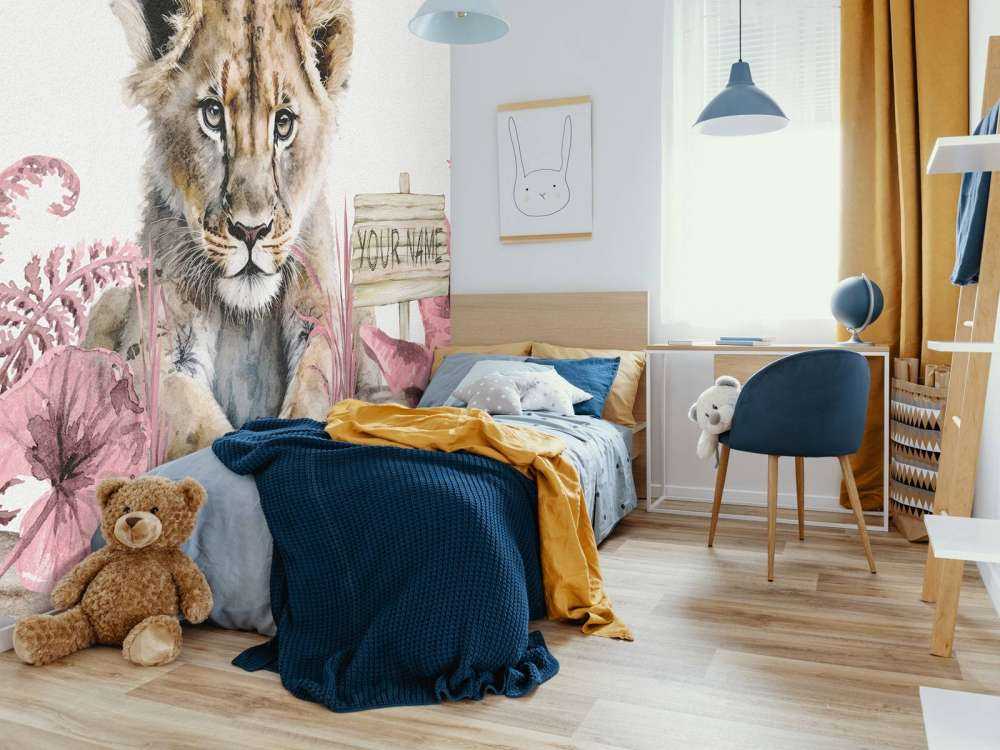 Young lion in the jungle pink