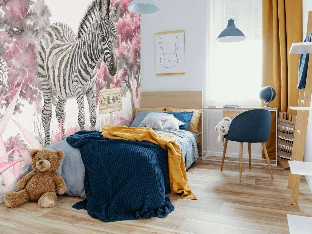 Young zebra in the wild pink