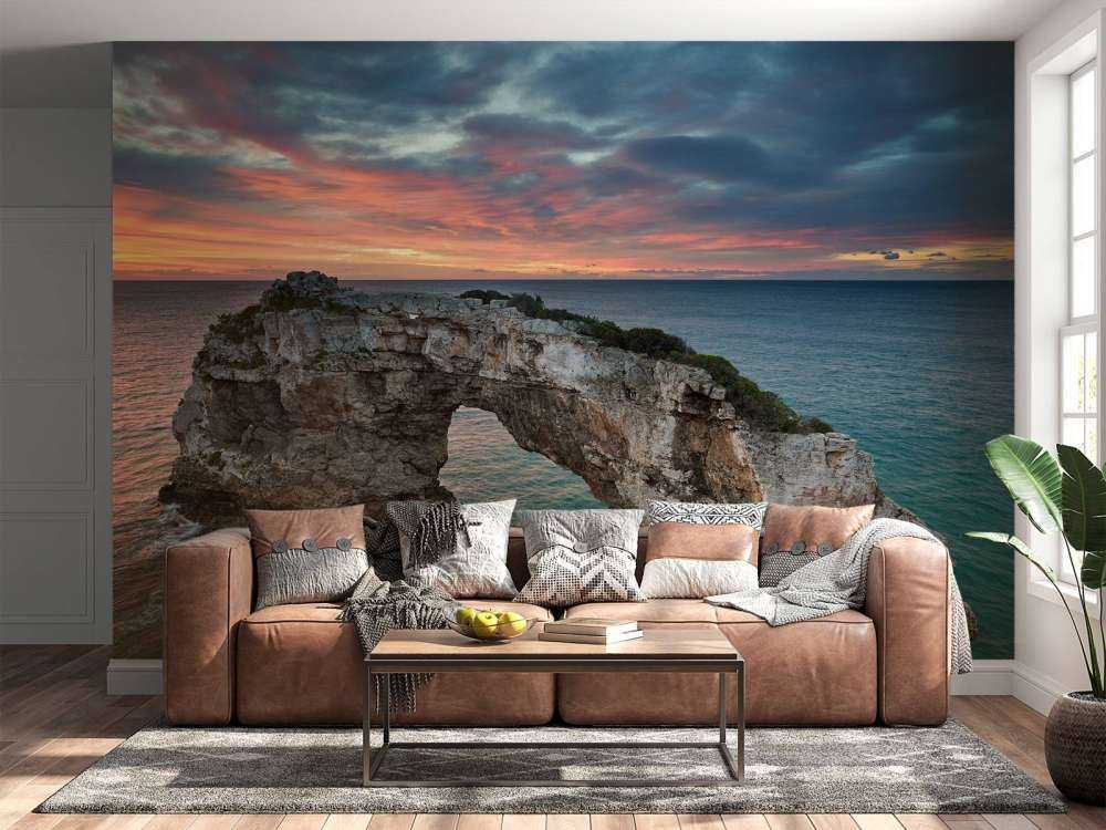 Curved rock in the sea