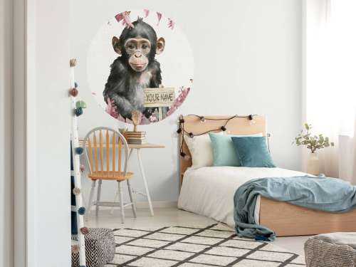 Baby chimpanzee in the jungle pink