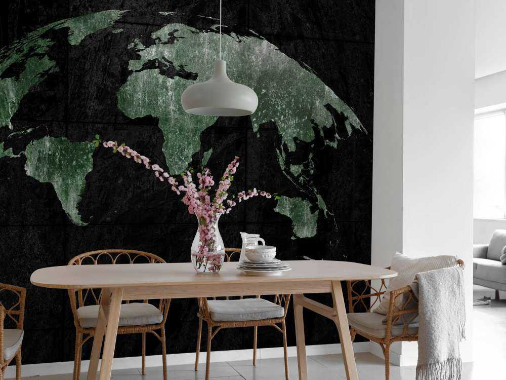 Green world map on concrete