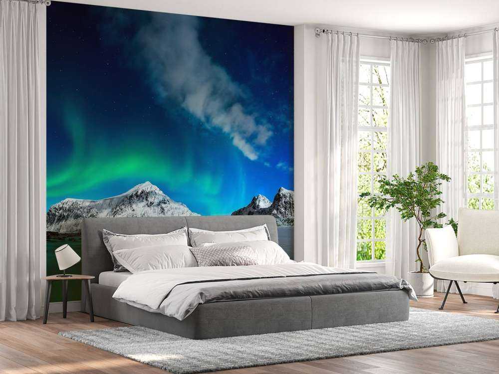 Northern lights above mountains