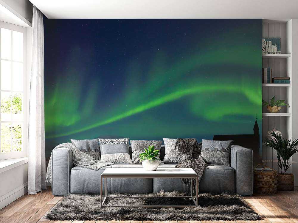 Northern lights above a church