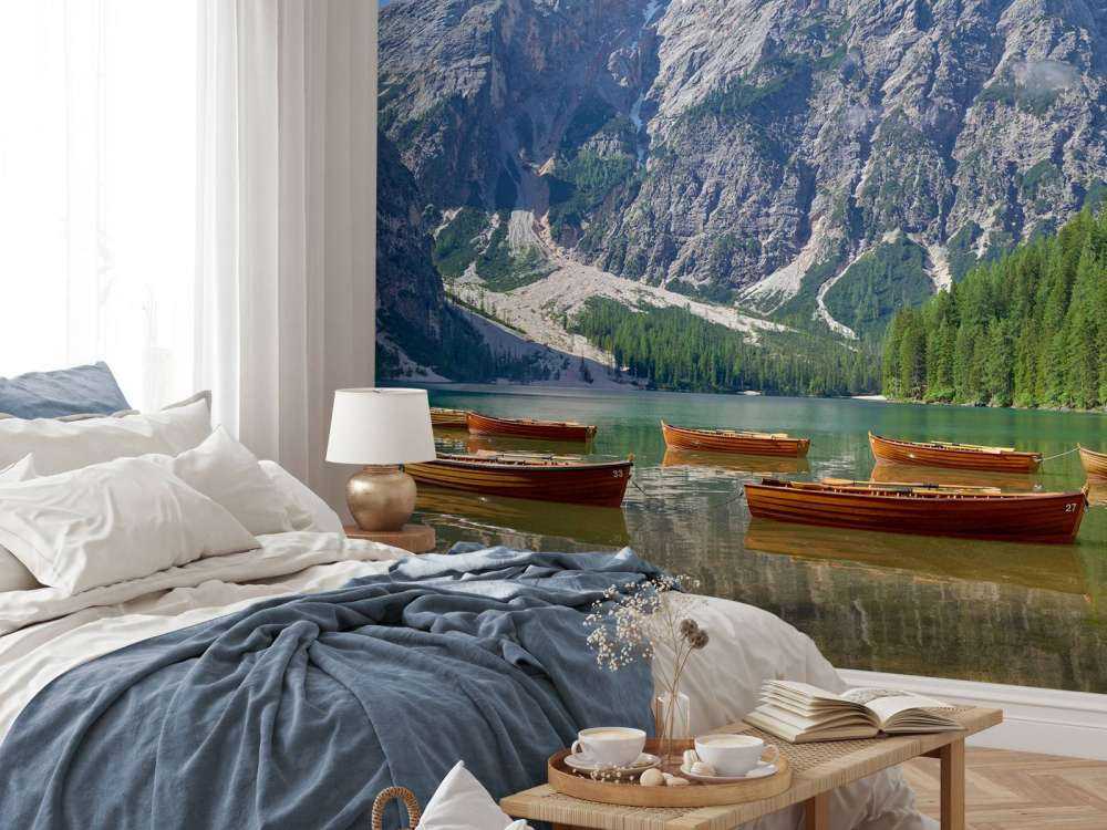 Wooden boats in mountain lake