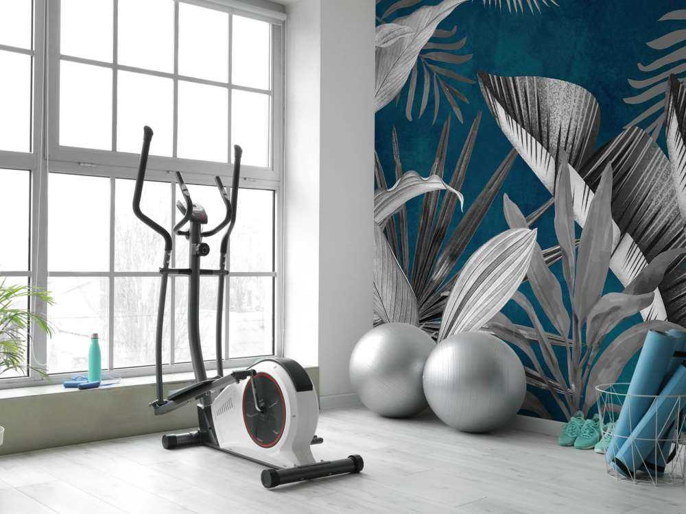 Tropical leaves on a blue background