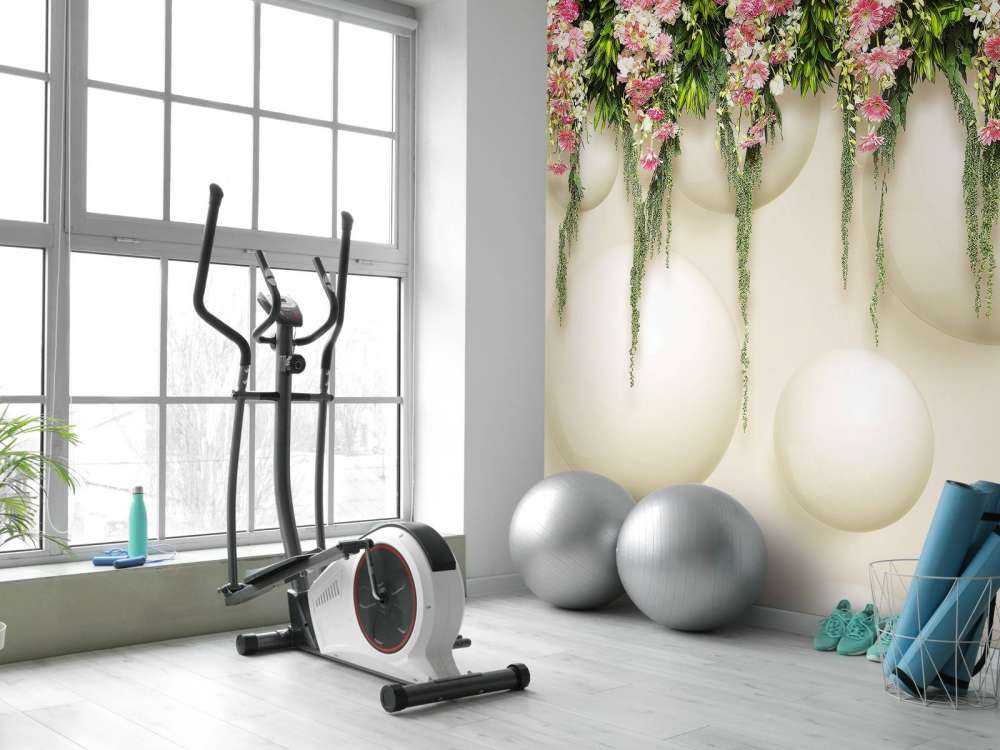 Hanging pink flowers on 3D wall