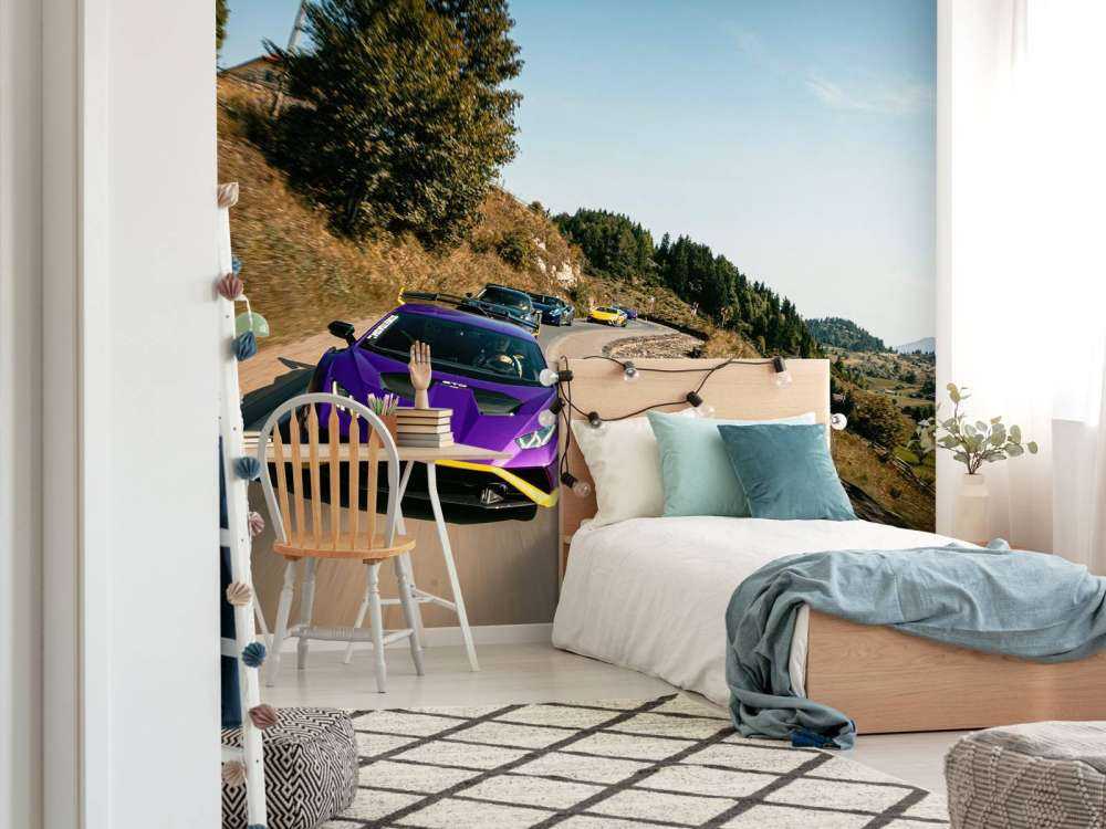 Supercar convoy through the mountains