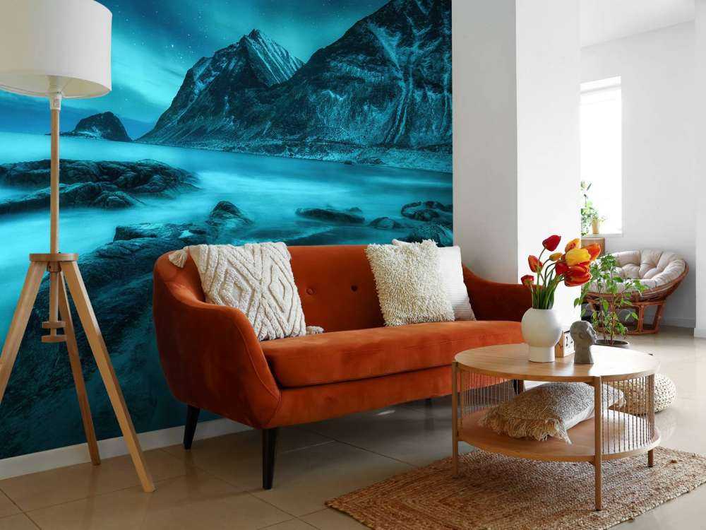 Blue northern lights with mountains