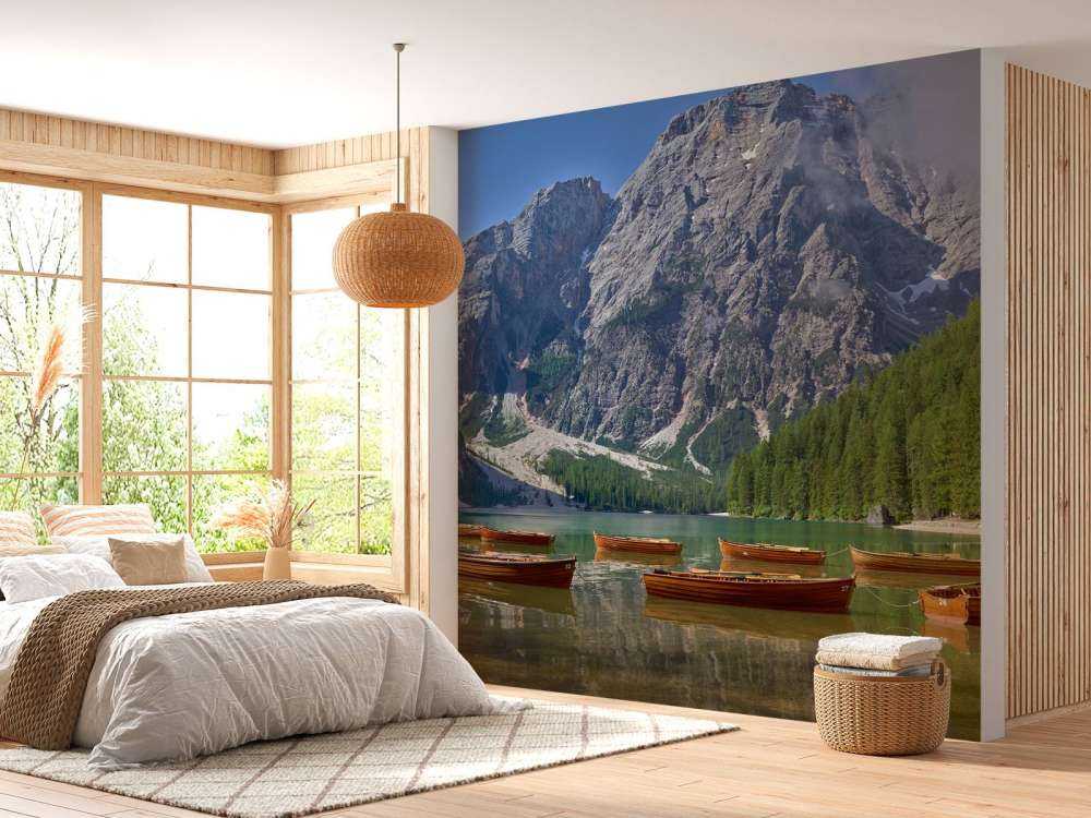 Wooden boats in mountain lake